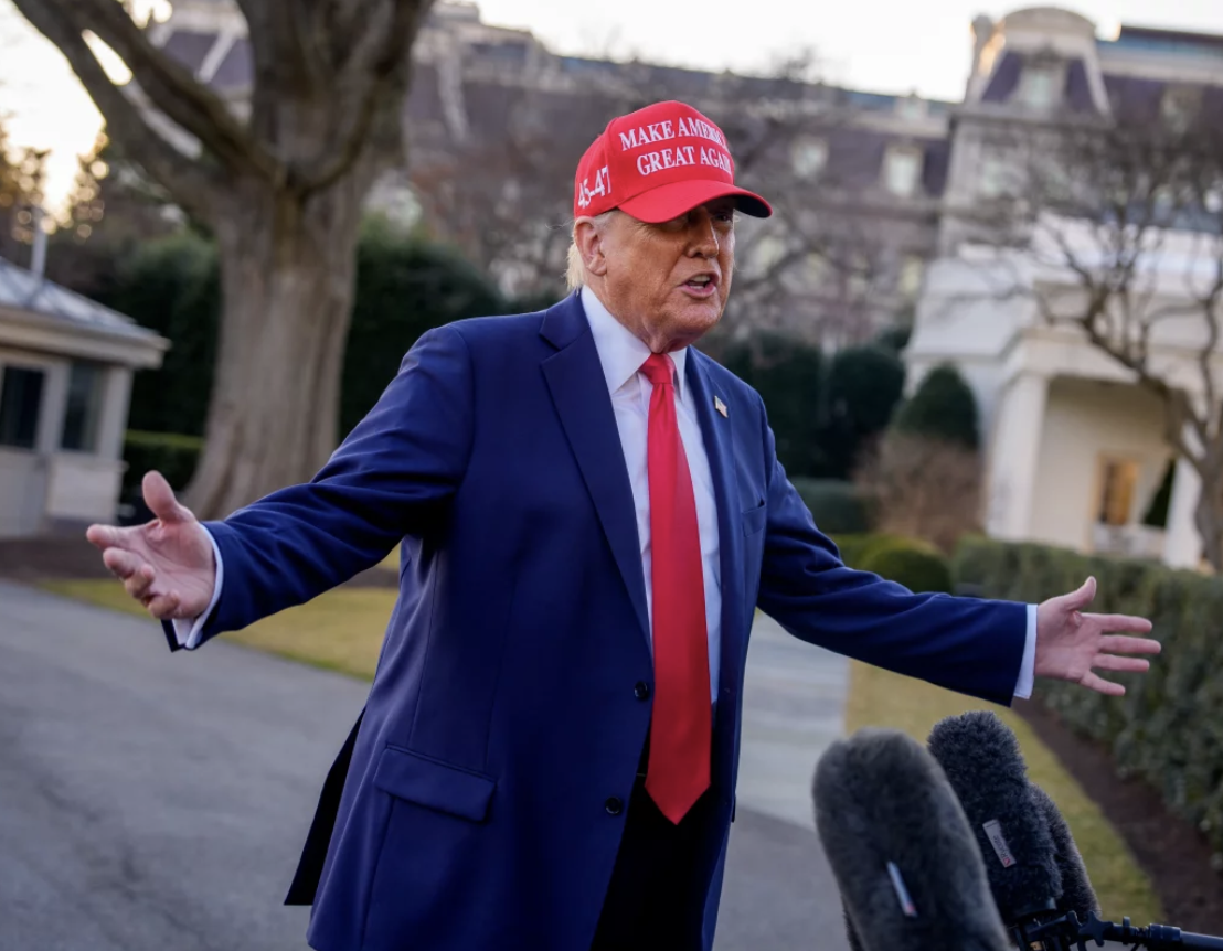 Trump speaks - arms wide - south lawn of the White House